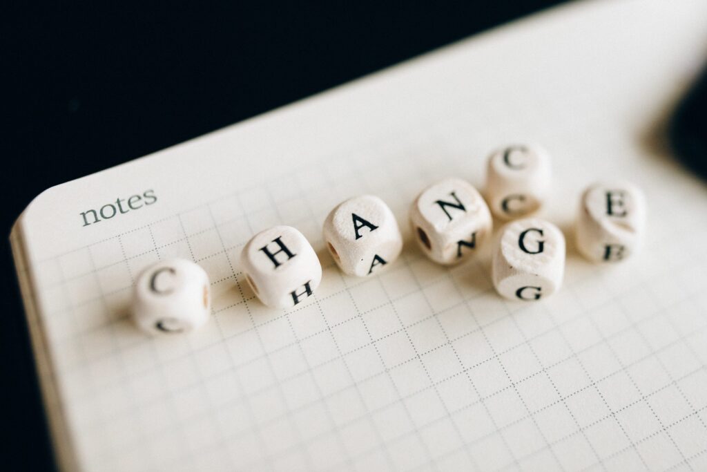 Lettered dice showing the word change